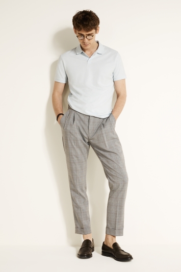 suit trousers and polo shirt