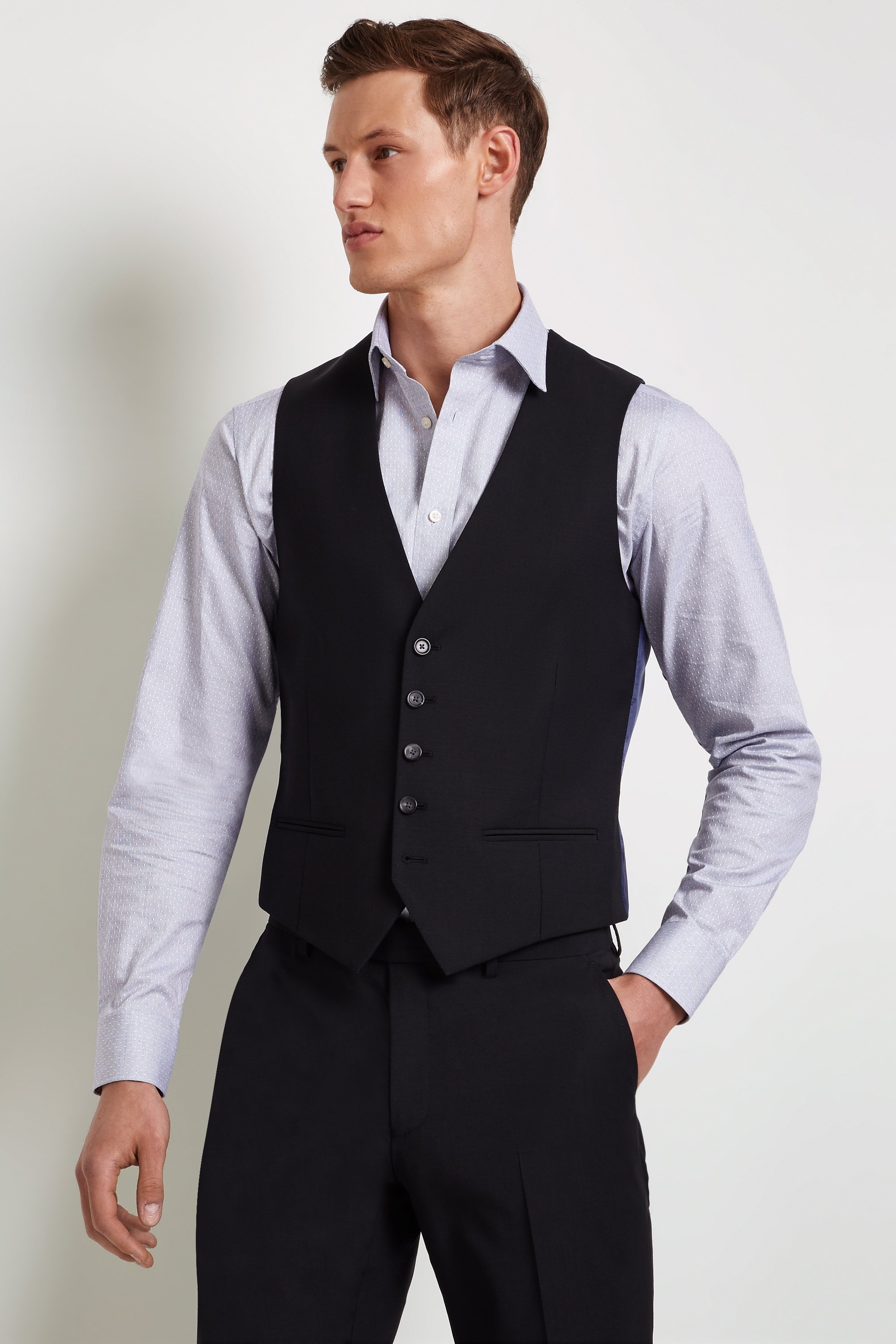 black shirt and black waistcoat