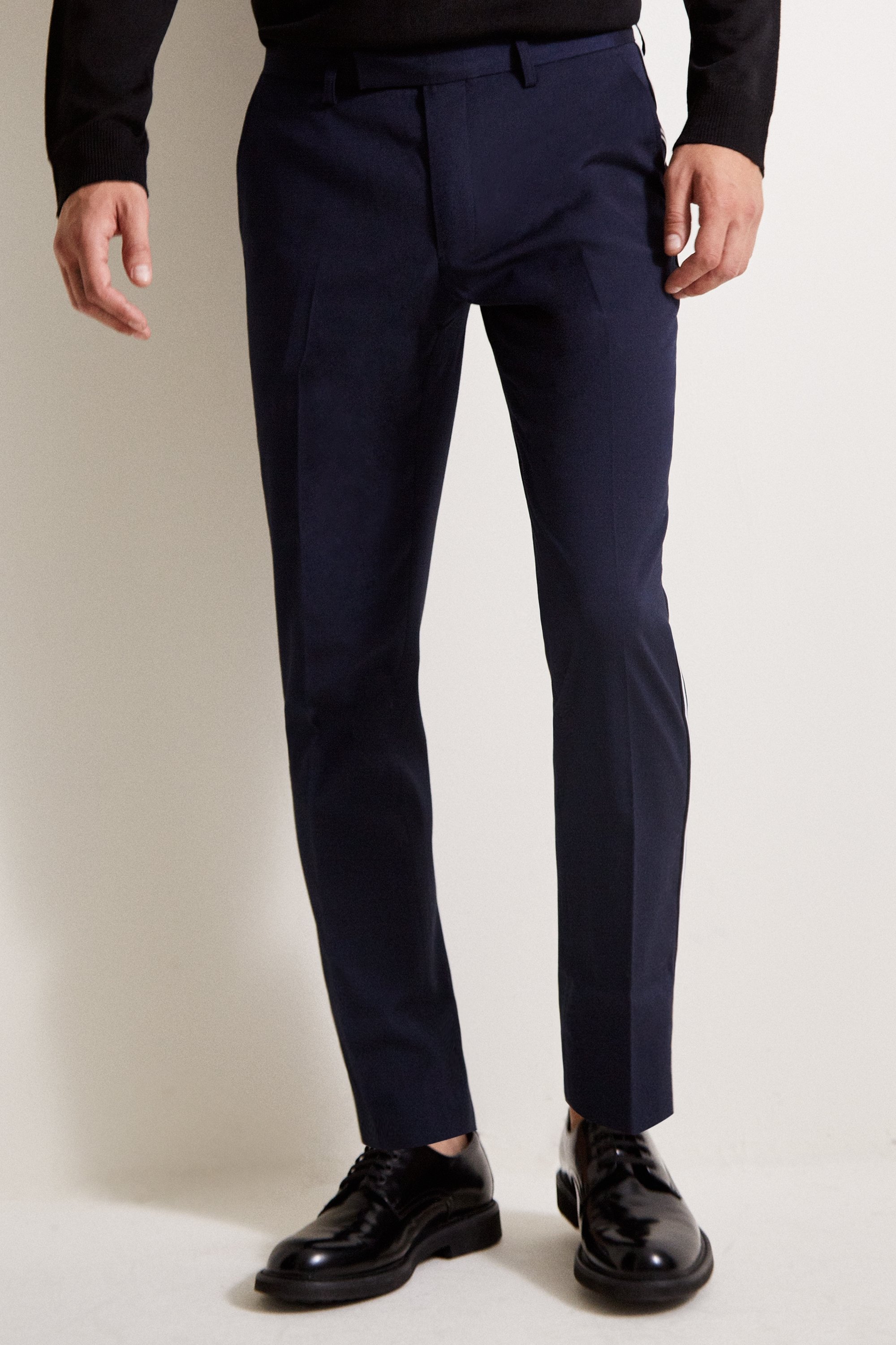 black pants with blue stripe