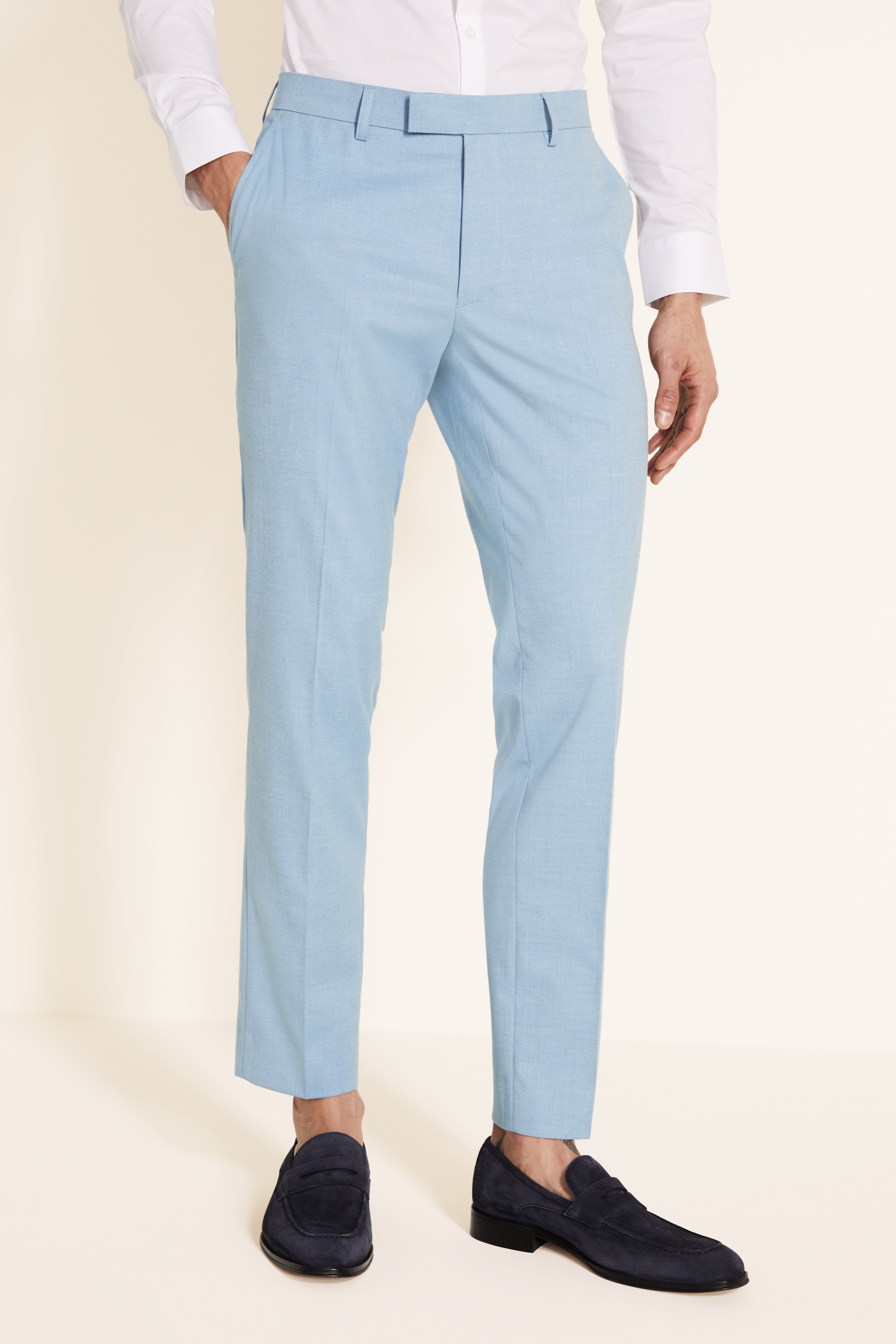 white shirt blue trousers