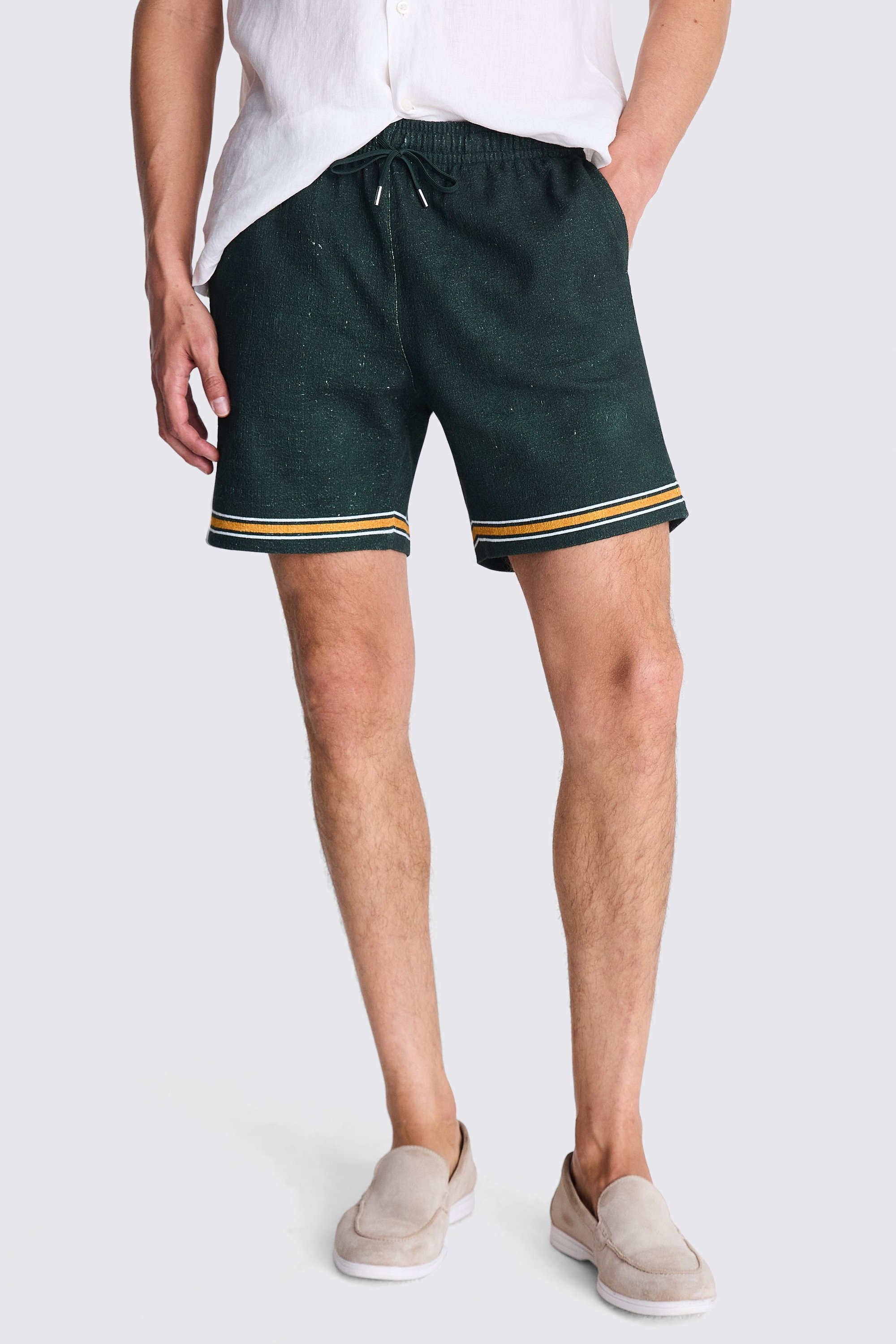 Off white and Green Border Print Shorts